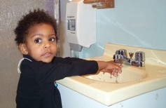 Girl washing hands