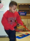 Boy playing xylophone