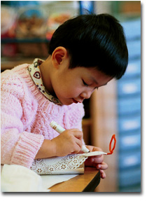 Girl using Magic Marker