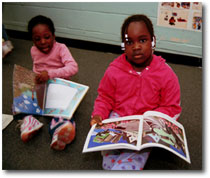 Two girls reading