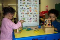 A boy and a girl playing together